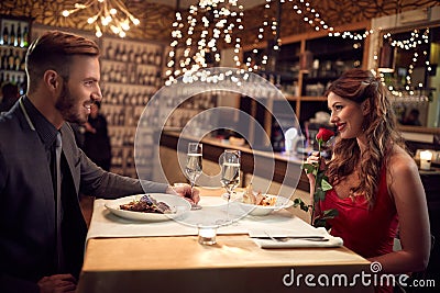Romantic couple have dinner in restaurant Stock Photo